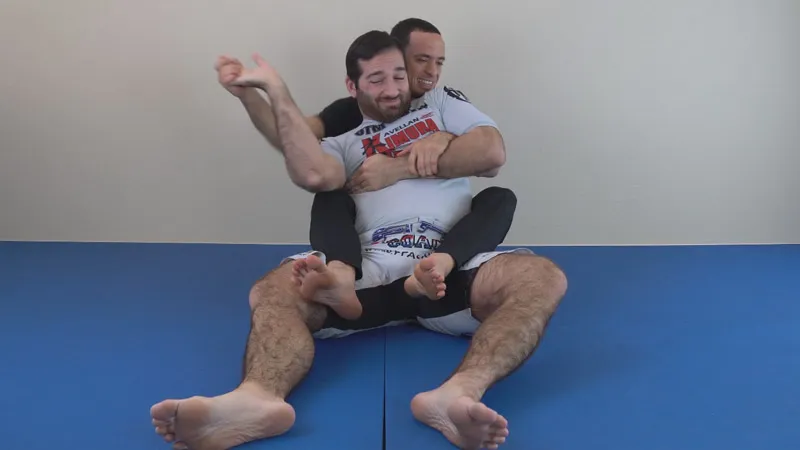 The 4-Finger Pull Back grip break for the rear naked choke, from the Back Attack Series